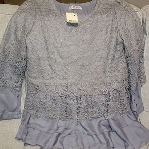 Top size XL fits like a small-med